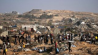 Palestinians heading to receive food and humanitarian aid packages from the Gaza Humanitarian Foundation, May 27, 2025. 