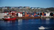 Containers are stacked at a port in Nuuk, Greenland, July 2017.
