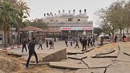 FILE: Palestinians inspect the site of an Israeli army airstrike on the European hospital in Khan Younis, Gaza Strip, Tuesday, May 13, 2025.