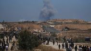 Smoke rises following an Israeli bombardment in southern Gaza as seen from Khan Younis, 29 May, 2025