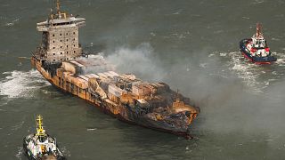 FILE - Smoke billows from the MV Solong cargo ship in the North Sea, off the Yorkshire coast, 11 March 2025.