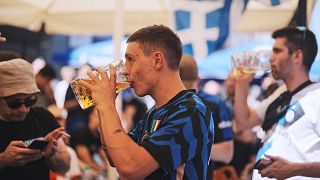 An Inter fan with a "Maß", the traditional measure of Munich lager. 