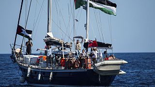 Activists of the Freedom Flotilla Coalition, board the Madleen boat, ahead of setting sail for Gaza, departing from the Sicilian port of Catania, Italy, Sunday, June 1, 2025.