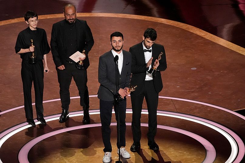 Rachel Szor, Hamdan Ballal, Basel Adra, and Yuval Abraham accept the Oscar for Best Documentary at this year's Oscars - 2 March 2025