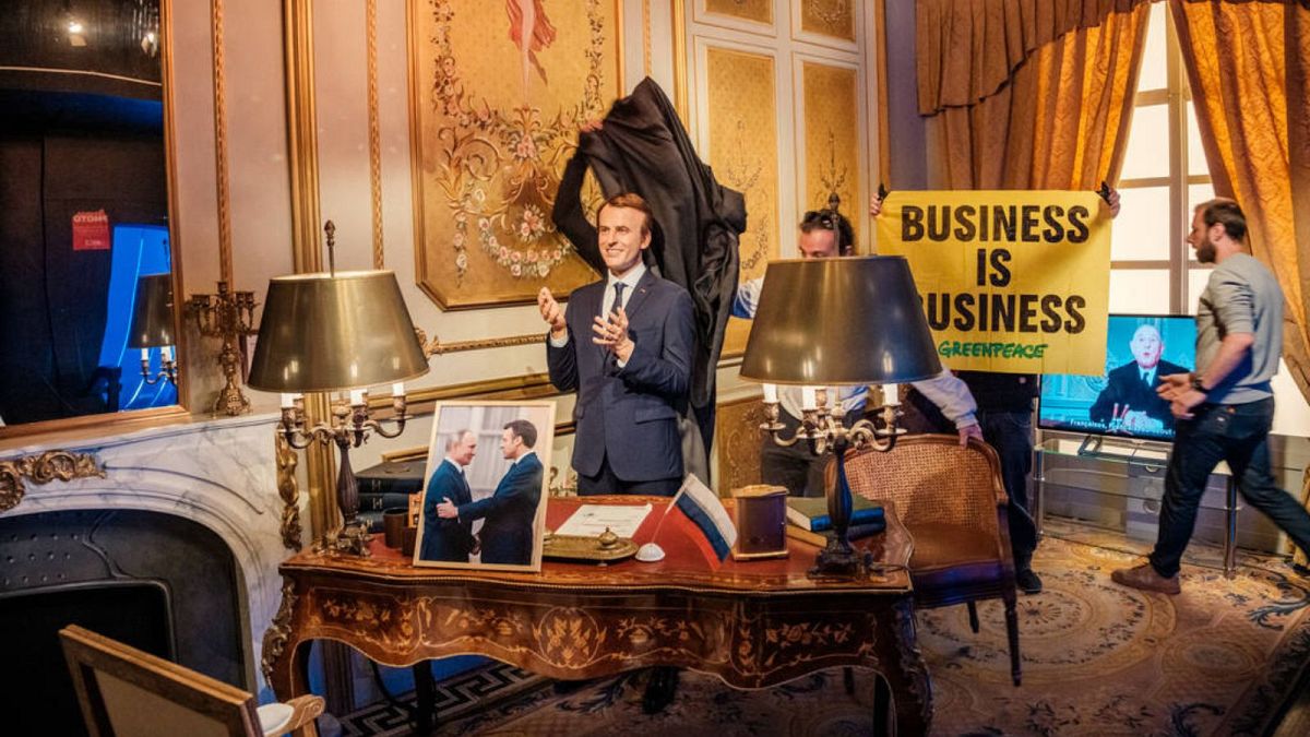 Why did activists steal the wax statue of Emmanuel Macron from museum?