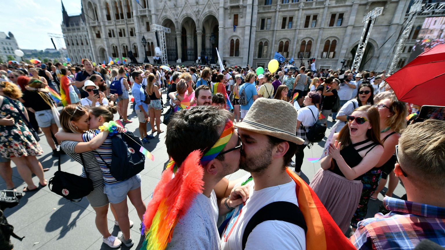 Couples kiss during a flash mob prior to the 24th Budapest Pride in the Hungarian capital, 6 July, 2019