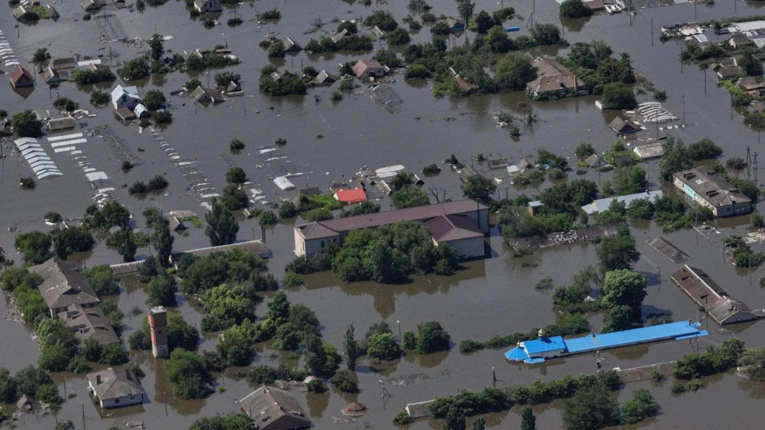 Houses are seen underwater in the flooded village of Dnipryany, in Russian-occupied Ukraine, Wednesday, June 7, 2023, after the collapse of Kakhovka Dam
