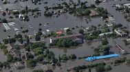 Houses are seen underwater in the flooded village of Dnipryany, in Russian-occupied Ukraine, Wednesday, June 7, 2023, after the collapse of Kakhovka Dam