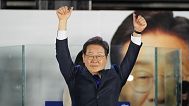 South Korea's Democratic Party's presidential candidate Lee Jae-myung, gestures as his supporters gather outside of the National Assembly in Seoul, Wednesday, June 4, 2025