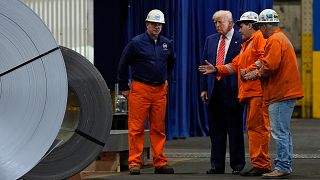 President Donald Trump talks to workers as he tours US Steel Corporation's Mon Valley Works-Irvin plant. 30 May, 2025, in West Mifflin, Pa. 