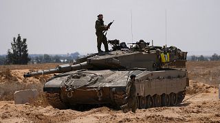 FILE: Israeli soldiers are seen near the border with the Gaza Strip, in southern Israel, 7 May 2024