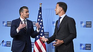 Defense Secretary Pete Hegseth, left, and NATO Secretary General Mark Rutte deliver statements ahead of a meeting of NATO defence ministers at NATO HQ in Brussels, 05.06.2025