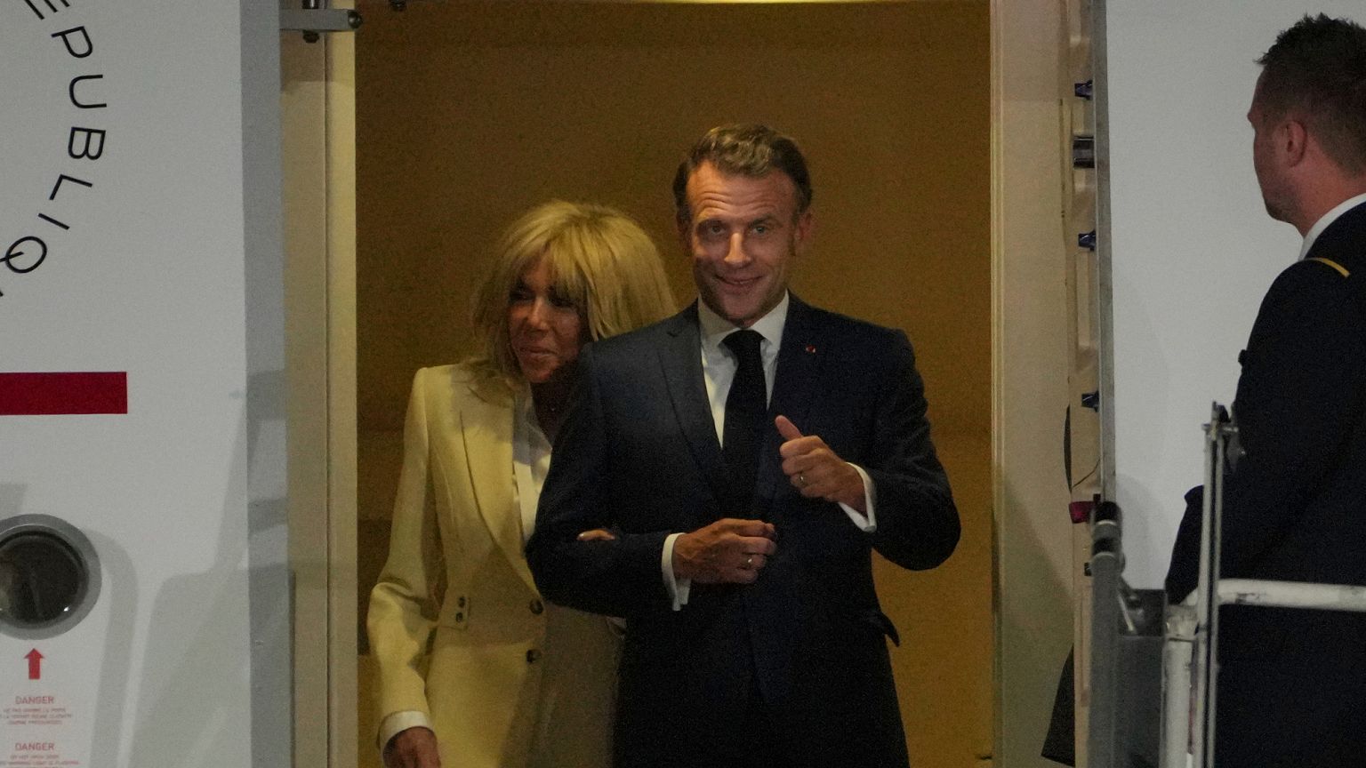 FILE - French President Emmanuel Macron and his wife Brigitte Macron disembark upon arrival in Jakarta, Indonesia, Tuesday, May 27, 2025. (AP Photo/Achmad Ibrahim)