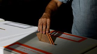 A man casts his ballot on referendums on citizenship and job protections at a polling station in Rome, 8 June, 2025