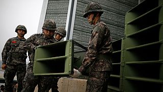 FILE: South Korean soldiers dismantle loudspeakers that set up for propaganda broadcasts near the demilitarized zone separating the Koreas in Paju, South Korea, 1 May, 2018