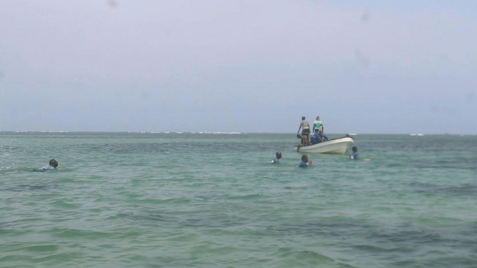 Djiboutian coastguard workers search for bodies of migrants who were washed away on the shore of the Red Sea, 2 October, 2024