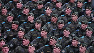 Troops march toward Red Square to attend a rehearsal for the Victory Day military parade in Moscow, Russia, on Tuesday, April 29, 2025