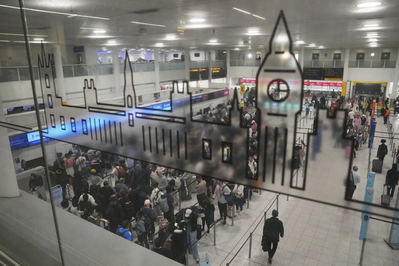A general view of part of the departure hall that is used by Air India at Gatwick Airport near London, Thursday, June 12, 2025
