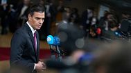 Spain's Prime Minister Pedro Sanchez speaks with the media as he arrives at the European Council building in Brussels, 26 October, 2023
