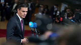 Spain's Prime Minister Pedro Sanchez speaks with the media as he arrives at the European Council building in Brussels, 26 October, 2023