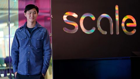 FILE - Scale AI founder and CEO Alexandr Wang poses for photos at the company's office in San Francisco, May 15, 2023.
