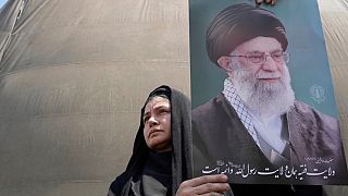  An Iranian protester holds a poster of Supreme Leader Ayatollah Ali Khamenei at an anti-Israel rally in Tehran, Iran, Friday, 13 June 2025.  