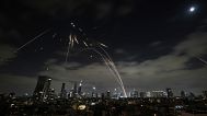 The Israeli Iron Dome air defence system fires to intercept missiles during an Iranian attack over Tel Aviv, 15 June, 2025