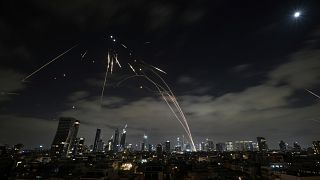 The Israeli Iron Dome air defence system fires to intercept missiles during an Iranian attack over Tel Aviv, 15 June, 2025