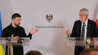 Ukraine's President Volodymyr Zelenskyy and Austrian President Alexander van Der Bellen attend a press conference in Vienna.