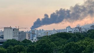 Smoke rises from the building of Iran's state-run television after an Israeli strike in Tehran, Iran, Monday, June 16, 2025.