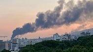 Smoke rises from the building of Iran's state-run television after an Israeli strike in Tehran, Iran, Monday, June 16, 2025