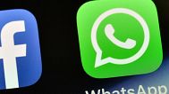 FILE - Mobile phone app logos for, from left, Facebook, Instagram and WhatsApp in are photographed in New York on Oct. 5, 2021.