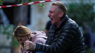 A father cries as his son is under the rubble of a multi-storey residential house destroyed by a Russian strike in Kyiv, Ukraine, on Tuesday, June 17, 2025. 