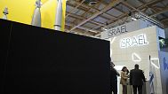 Visitors stand by the Israeli pavilions blocked by a black wall at the Paris Air Show Tuesday, June 17, 2025 in Le Bourget, north of Paris.