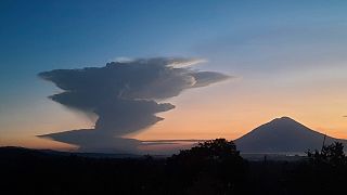 Volcanic smoke billows from Mount Lewotobi Laki-Laki during an eruption, as seen from Lembata, Indonesia, Tuesday, June 17, 2025. 
