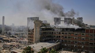 Smokes raises from a building of the Soroka hospital complex after it was hit by a missile fired from Iran in Be'er Sheva, 19 June 2025