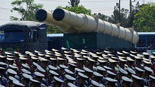 FILE: A missile system is carried on a truck during a parade commemorating National Army Day near Tehran, 18 April 2025