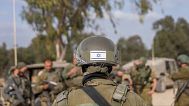 FILE: Israeli soldiers gather in southern Israel, 1 May 2024
