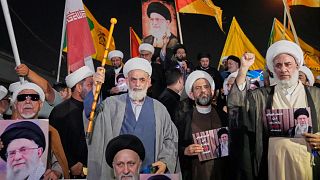Iraqis Shiite clerics protest against Israeli attacks on Iran, near the fortified Green Zone where the US embassy is located in Baghdad, 19 June 2025