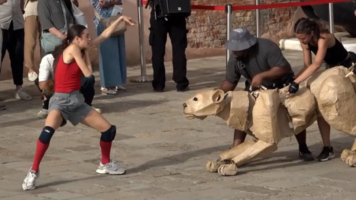 Life-size puppet herds march across continents for climate action
