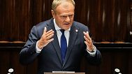 Poland's Prime Minister Donald Tusk addresses the Polish parliament on Wednesday, June 11, 2025, in Warsaw, Poland