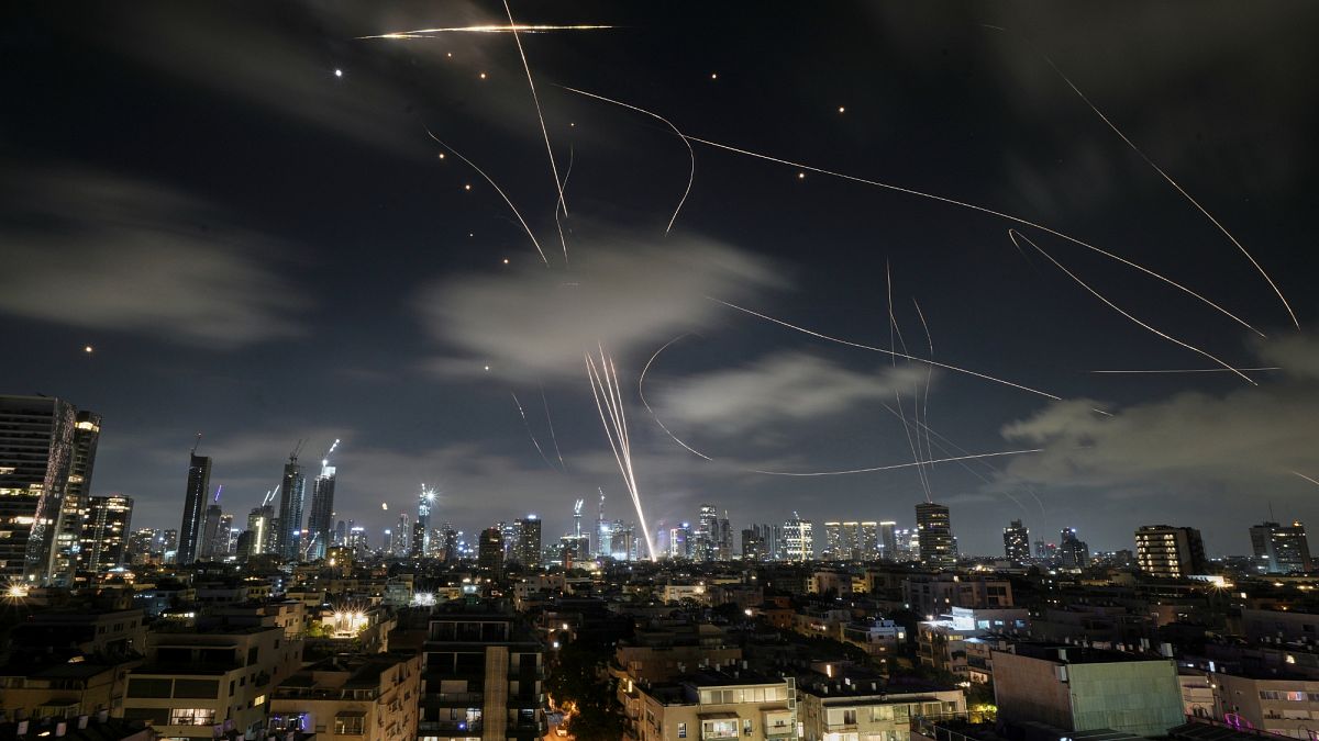 Iran targets Tel Aviv with missile strikes, causing damage