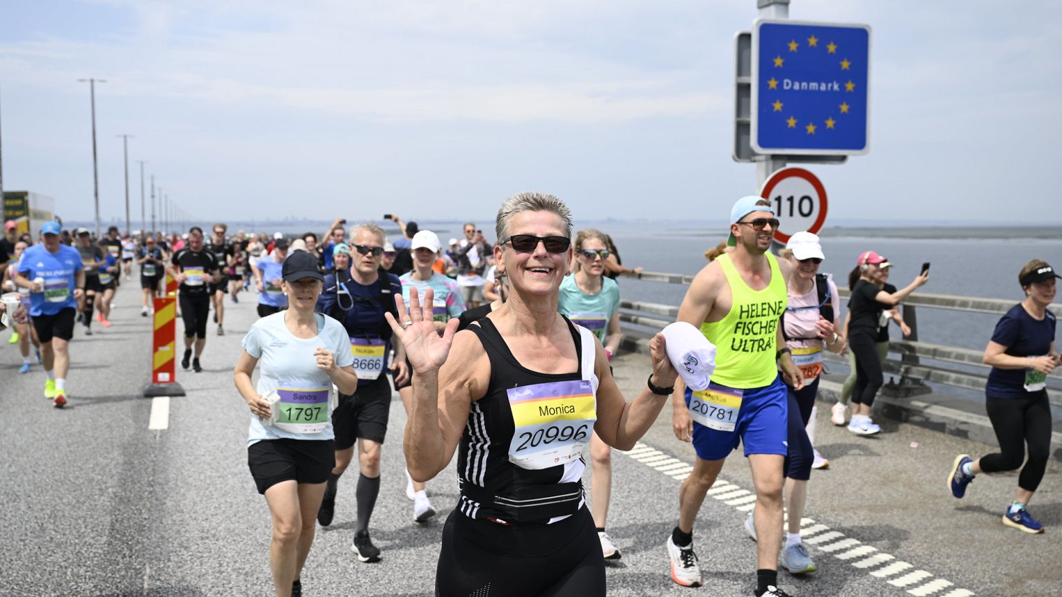 Some 40,000 runners cross Europe's longest bridge and tunnel link on its 25th  anniversary | Euronews