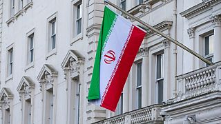FILE: The national flag of the Peoples Islamic Republic of Iran flies outside its embassy in London, Thursday, Feb. 20, 2014.
