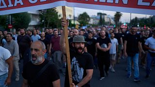 Protesters shout slogans during an anti-war rally outside the U.S. Embassy in Athens, Greece