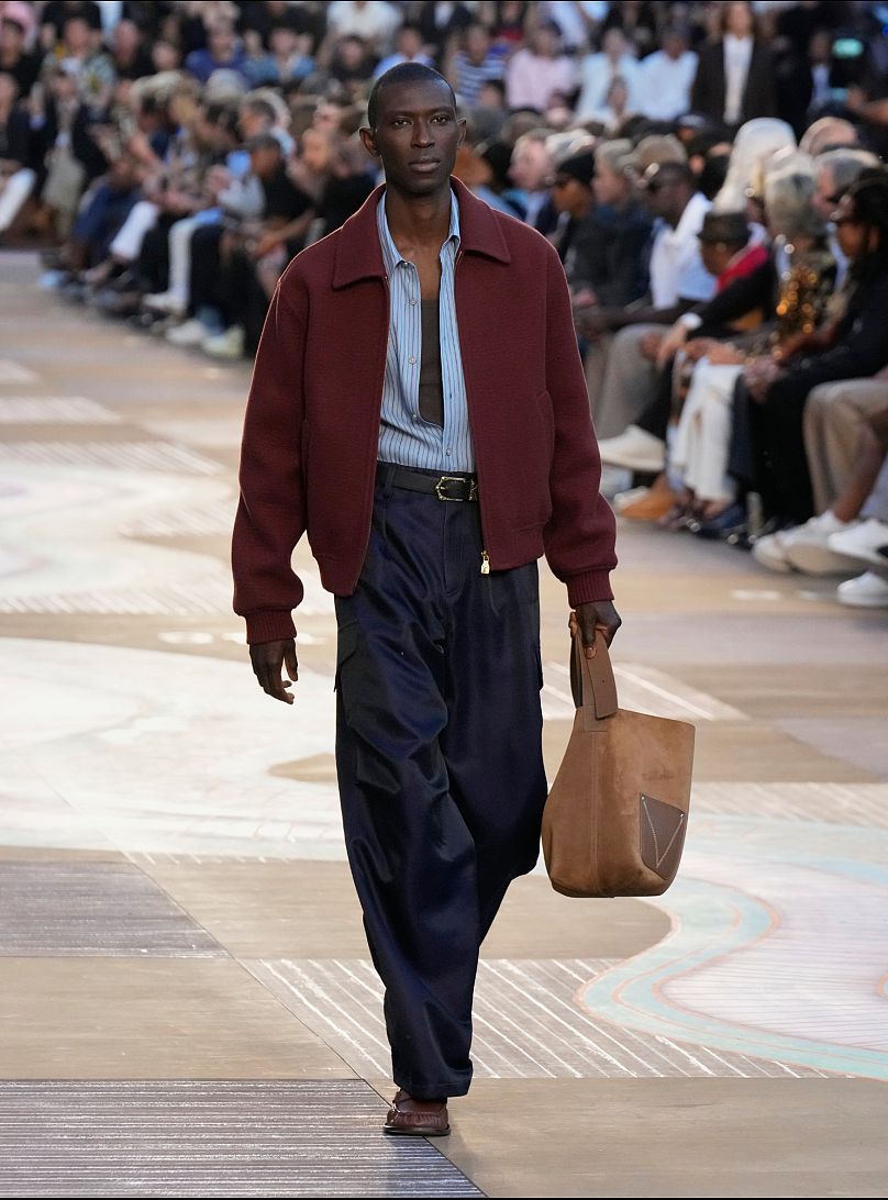 A model wears a creation as part of the men's Louis Vuitton Spring-Summer 2026 collection, that was presented in Paris, Tuesday, 24 June 2025.