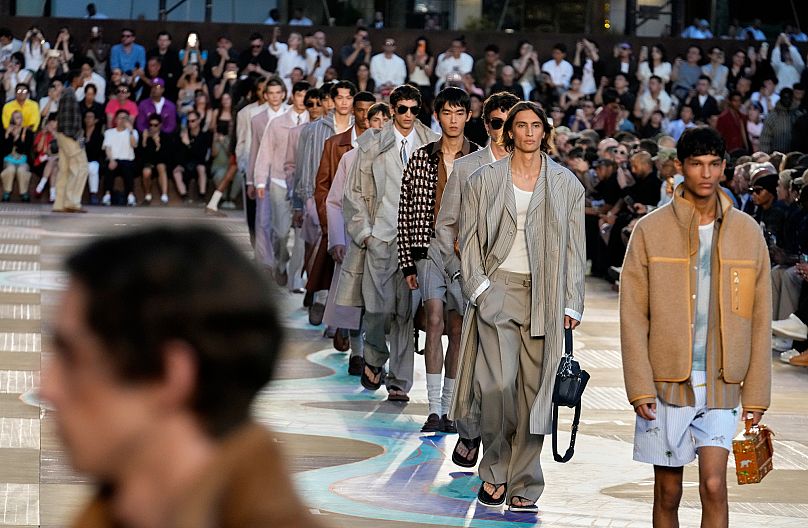 Models wear creations as part of the men's Louis Vuitton Spring-Summer 2026 collection, that was presented in Paris, Tuesday, 24 June 2025.