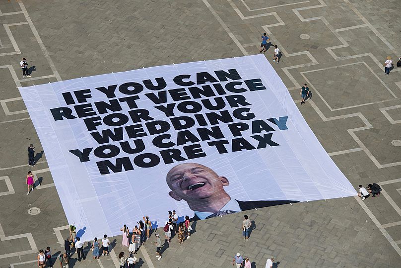 The Bezos protest banner on St Mark's Square