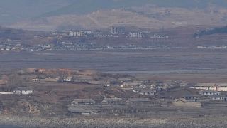FILE - Neighbourhoods of North Korea's Kaepoong village are seen from the observation post in Ganghwa  near the border with North Korea, South Korea, 28 Feb 2023.