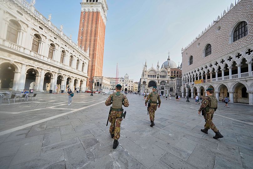 Italian Army soldiers patrol St. Mark’s Square ahead of the weekend wedding 